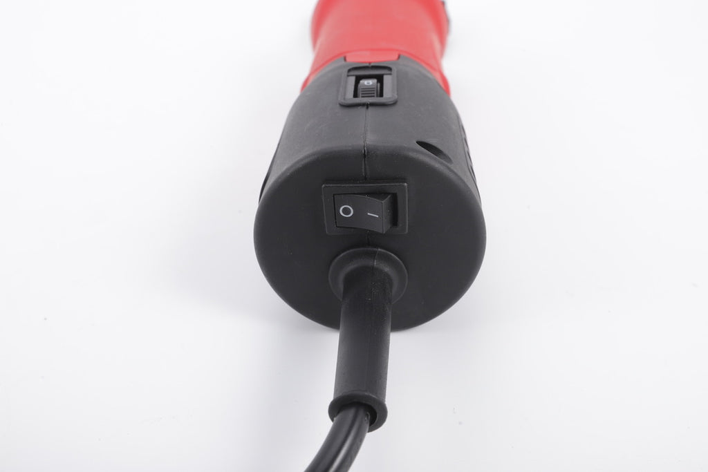 Close-up of on/off switch on professional 350W electric sheep shears