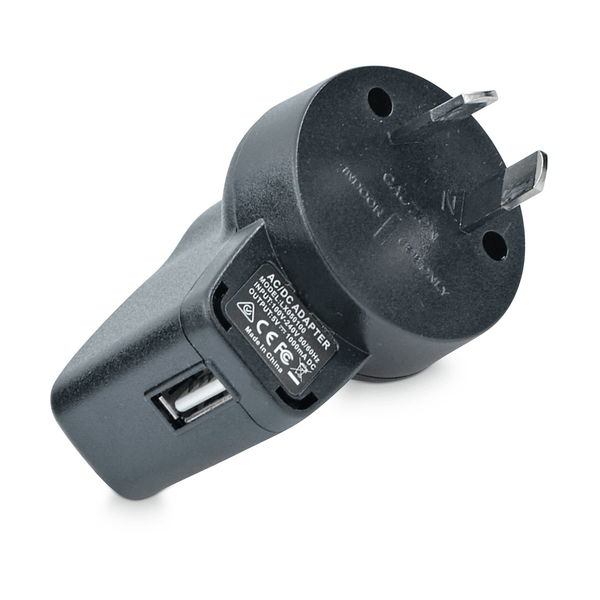 The 5V USB Adaptor Plug for Deluxe Electric Dog Fence by Pet Control HQ is a premium USB wall charger with a standard plug, featuring a 5V charging output. It includes one USB port and prominently displays safety certification logos on its side.